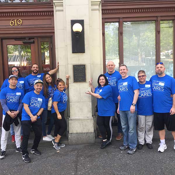 Comcast Employees at the Saint Charles Apartments on Comcast Cares Day 2019.