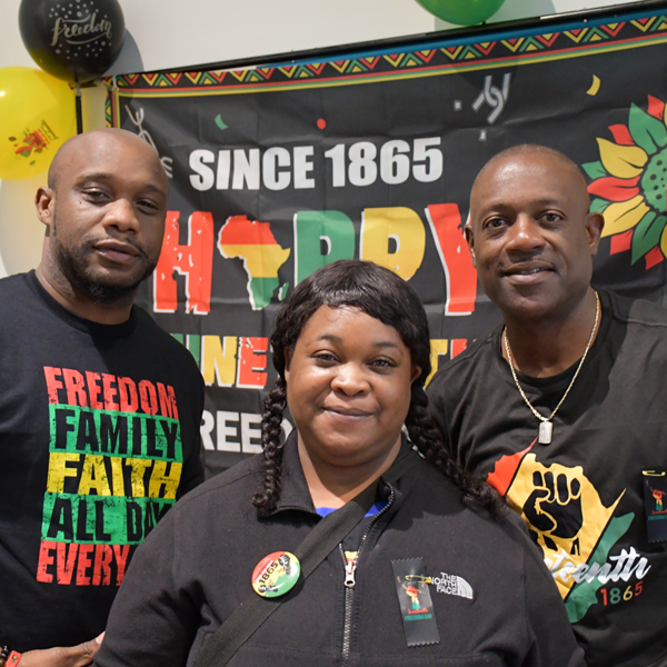 Plymouth staff members pose for a photo at a Juneteenth celebration