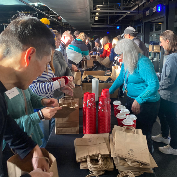 Volunteers assemble care kits for Plymouth Housing residents